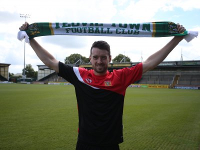 Brendan Malone Signs on