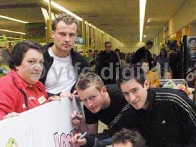 Lee Johnson, Colin Miles and Nick Crittenden provide their autographs