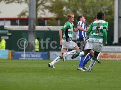 Nathan Smith and Shaun MacDonald in action against Sheffield Wednesday